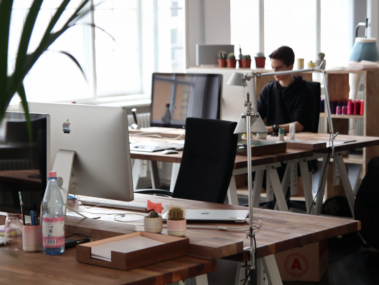 office-space-people-working-on-desk