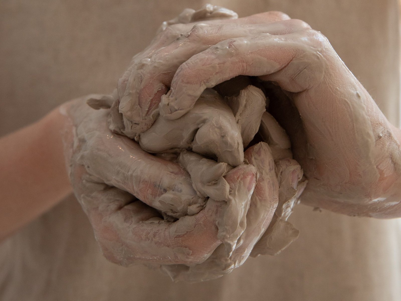 clay-on-woman's-hand